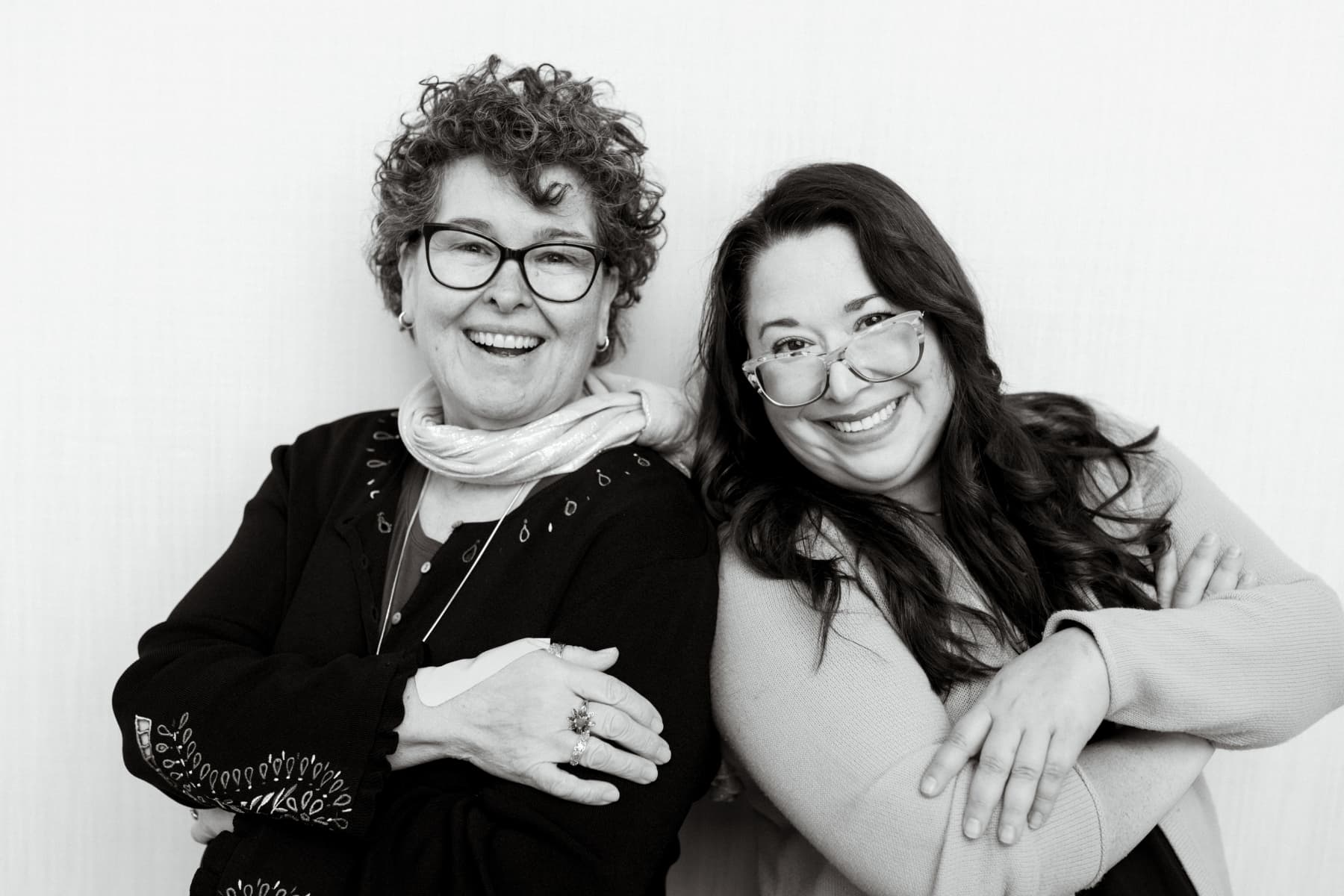 Maria Ladd and Amy Ford, Co-Founders of the Clinical Research Site Collective, laughing together